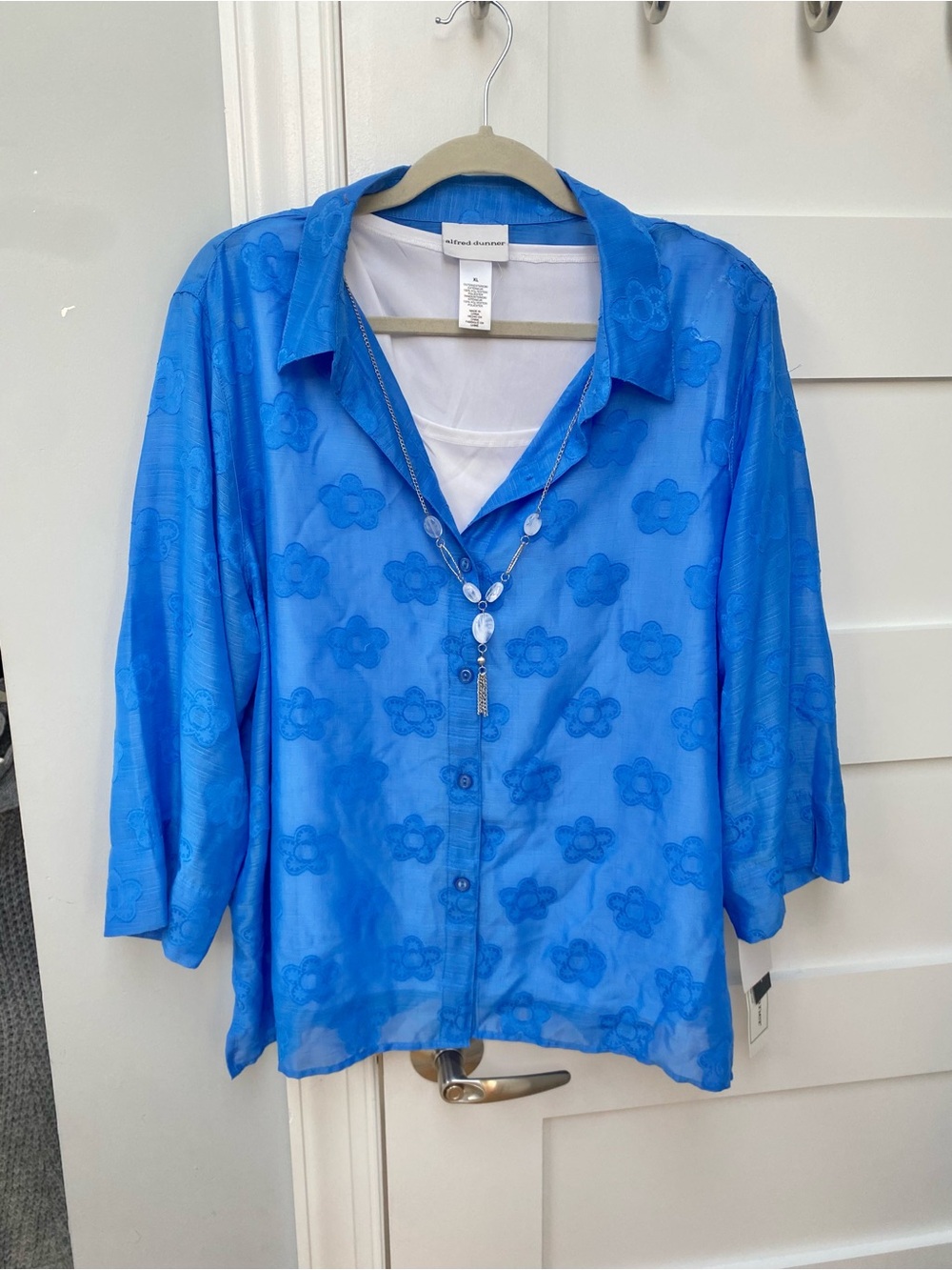 lightweight blue floral three quarter sleeve blouse with necklace